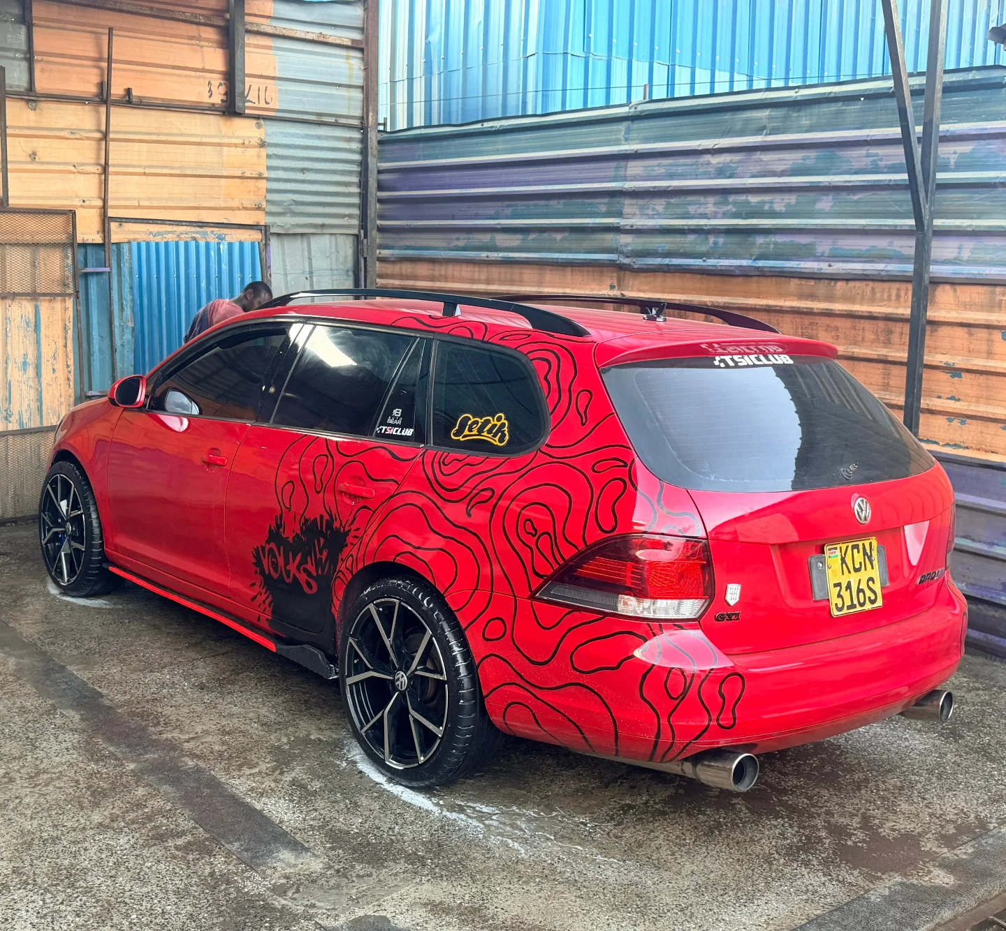 Red VW Golf with topographic custom paint by Setik